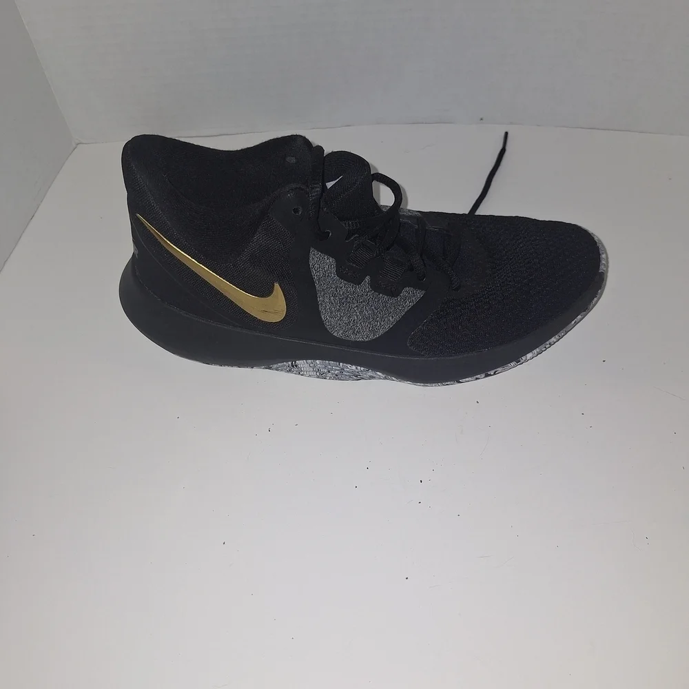 Nike Black and Gray Sneakers with Gold Swoosh